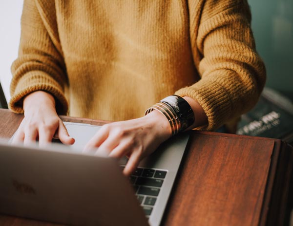 girl using laptop